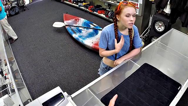 Sexy redhead bitch sucks big white dick at pawnshop