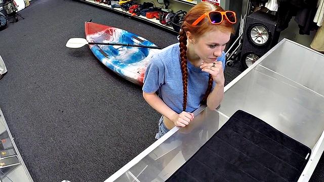 Sexy redhead bitch sucks big white dick at pawnshop