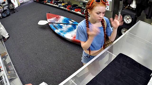Sexy redhead bitch sucks big white dick at pawnshop