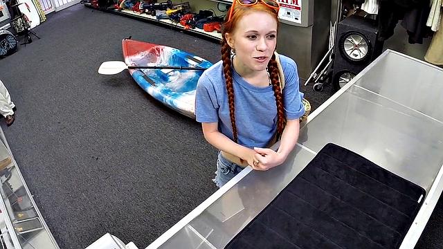 Sexy redhead bitch sucks big white dick at pawnshop