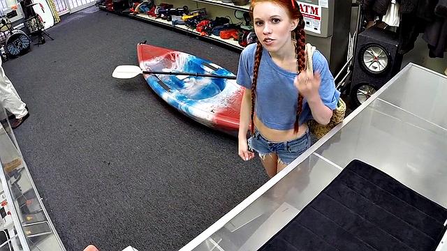 Sexy redhead bitch sucks big white dick at pawnshop