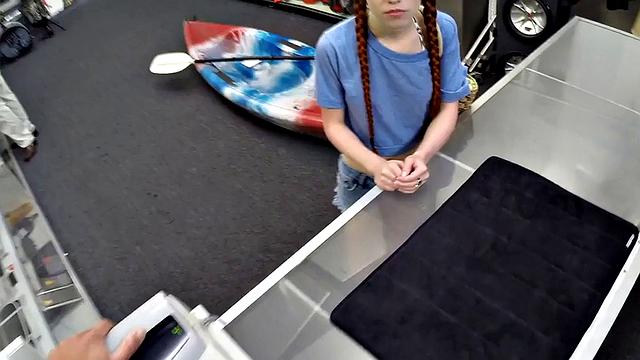 Sexy redhead bitch sucks big white dick at pawnshop