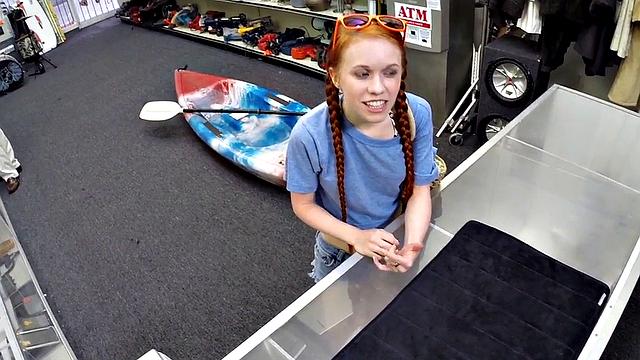 Sexy redhead bitch sucks big white dick at pawnshop