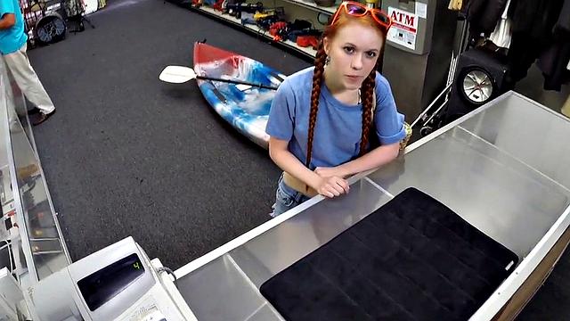 Sexy redhead bitch sucks big white dick at pawnshop