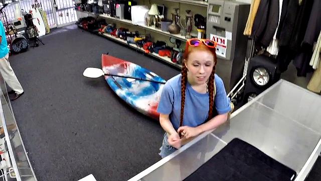 Sexy redhead bitch sucks big white dick at pawnshop