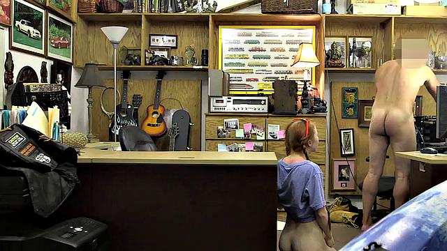 Sexy redhead bitch sucks big white dick at pawnshop