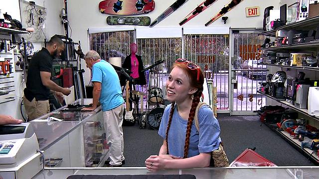 Sexy redhead bitch sucks big white dick at pawnshop