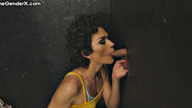 Tgirl deepthroating from gloryhole