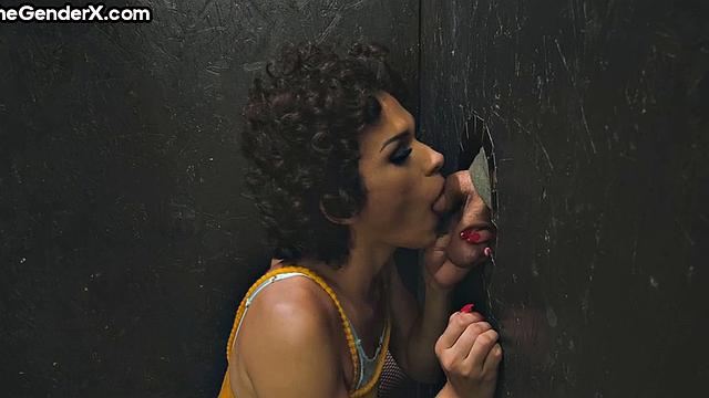 Tgirl deepthroating from gloryhole