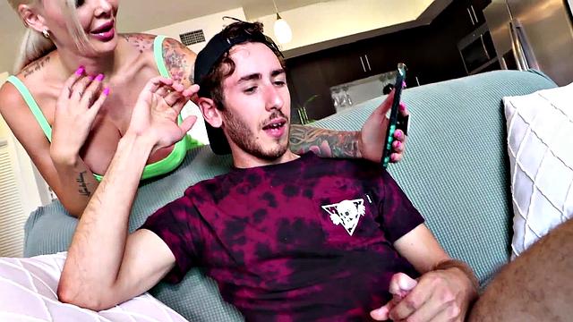 Big-titted nympho MILF strokes cock while teasing him