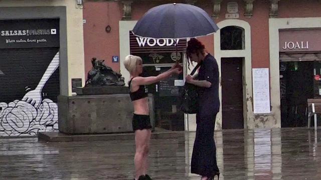 Lezdom redhead MILF shows teen servant outdoors in public