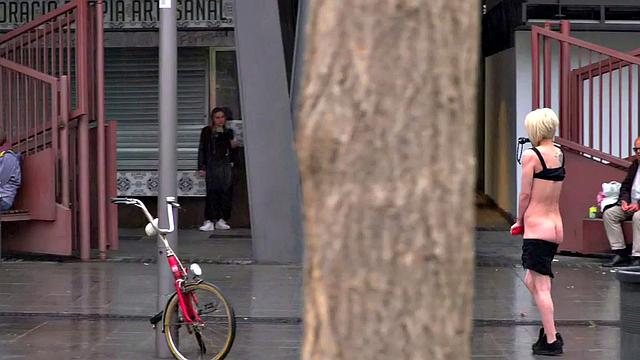 Lezdom redhead MILF shows teen servant outdoors in public