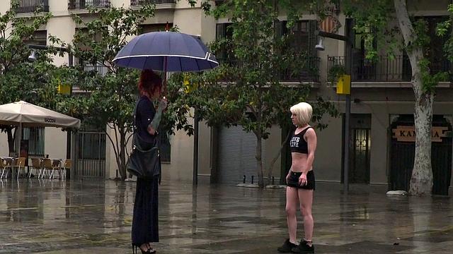 Lezdom redhead MILF shows teen servant outdoors in public
