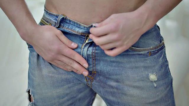 Ripped hunk wanking hard cock before cum spraying