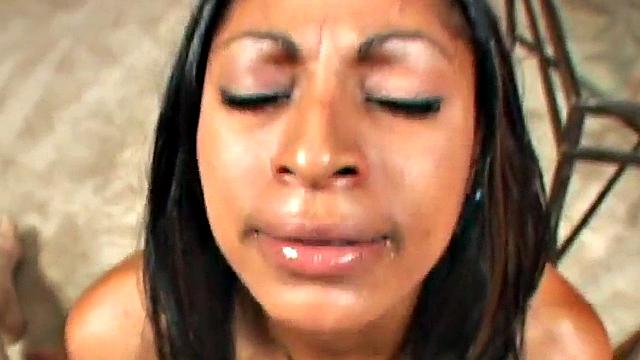 Ebony teen toys her pussy