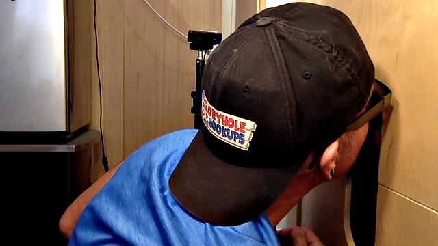 Gray gaydaddy giving head and tug to gloryhole top