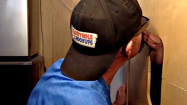 Gray gaydaddy giving head and tug to gloryhole top