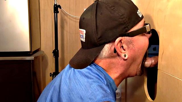 Gloryhole daddy face jizzed after giving blowjob
