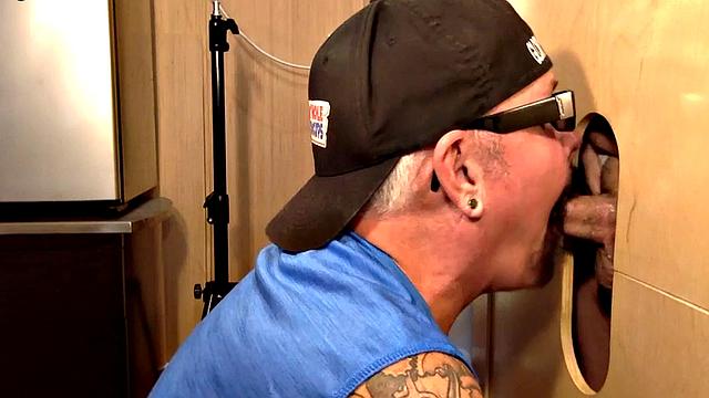 Gloryhole daddy face jizzed after giving blowjob