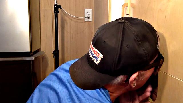 Gloryhole daddy face jizzed after giving blowjob