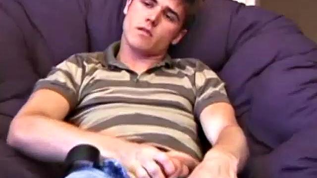 Austin pulls down his jeans and gets his cock hard. He stands to give us a good look at his tight body and hot ass, before sitting back down to jerk off.