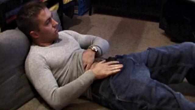 Johnny Johnson starts a porn video. Revealing his hairy chest, this young man sticks his hand down his jeans and massages his cock. This boy has big arms and a big dick that he loves to show off.