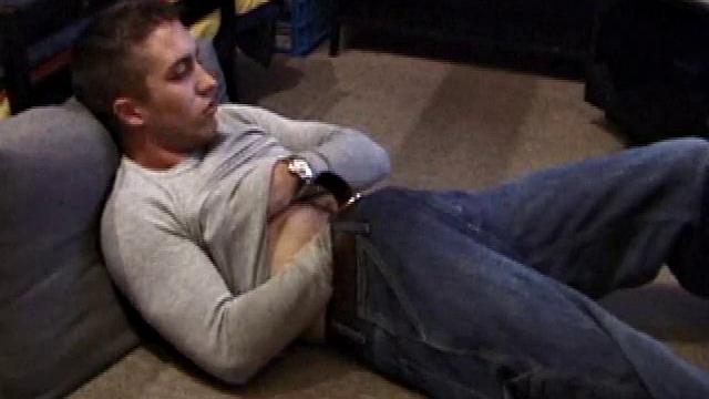 Johnny Johnson starts a porn video. Revealing his hairy chest, this young man sticks his hand down his jeans and massages his cock. This boy has big arms and a big dick that he loves to show off.