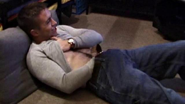 Johnny Johnson starts a porn video. Revealing his hairy chest, this young man sticks his hand down his jeans and massages his cock. This boy has big arms and a big dick that he loves to show off.