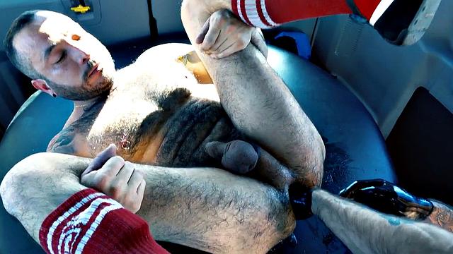 Fisting hunk with gloves fists hairy hole in van