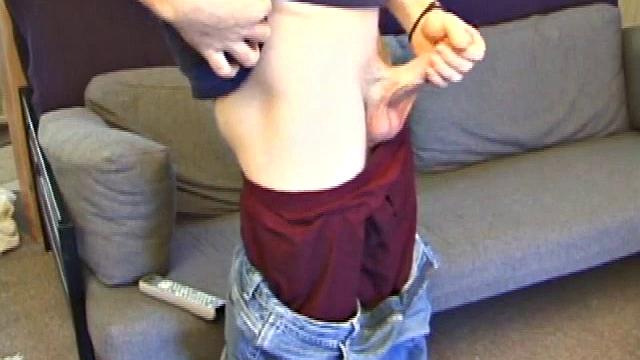 With a porn video playing for stimulation, Cory Woodall pulls down his pants and lubes up his cock. He strokes with determination, edging himself a few times, before shooting onto his stomach.