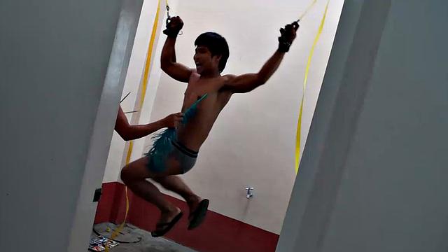 Str8 Pinoy stud Jesse Rivera is back in the tickle rack but not before he is suspended by his wrists for some wild male tickling action. Ricky tickles his sexy smooth body with feathers. Then he starts poking and tickling with his fingers.