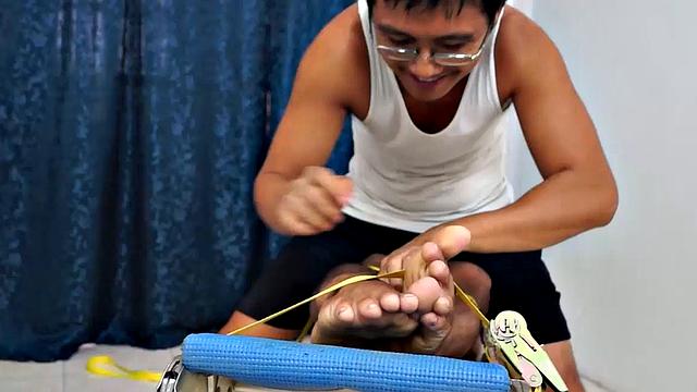 Str8 Pinoy stud Jesse Rivera is back in the tickle rack but not before he is suspended by his wrists for some wild male tickling action. Ricky tickles his sexy smooth body with feathers. Then he starts poking and tickling with his fingers.