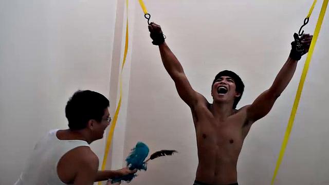 Str8 Pinoy stud Jesse Rivera is back in the tickle rack but not before he is suspended by his wrists for some wild male tickling action. Ricky tickles his sexy smooth body with feathers. Then he starts poking and tickling with his fingers.