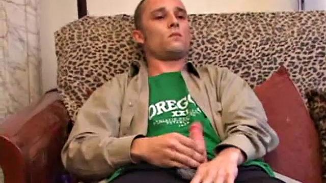 Amateur Casey Olson methodically strips down, as he works on his growing cock. Once naked and boned up, he strokes with determination. After bringing himself close to the edge, he explodes all over his chest.