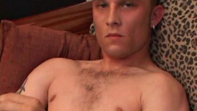 Amateur Casey Olson methodically strips down, as he works on his growing cock. Once naked and boned up, he strokes with determination. After bringing himself close to the edge, he explodes all over his chest.