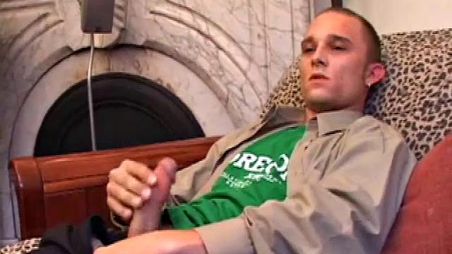 Amateur Casey Olson methodically strips down, as he works on his growing cock. Once naked and boned up, he strokes with determination. After bringing himself close to the edge, he explodes all over his chest.