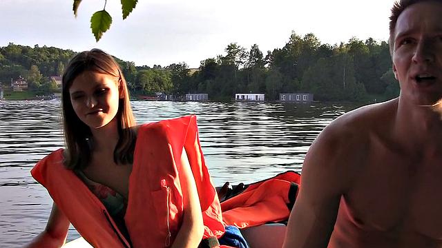 Skinny girl gets nailed in a boat in a MMF threesome