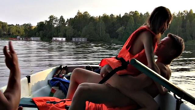 Skinny girl gets nailed in a boat in a MMF threesome