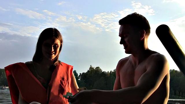 Skinny girl gets nailed in a boat in a MMF threesome