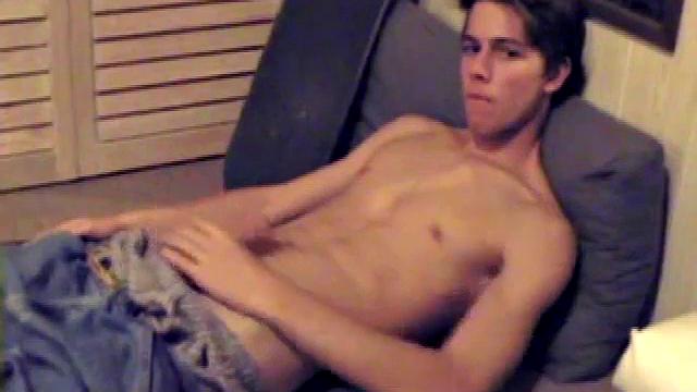 Fabulously tight and lean, Jayden works his cock for a while inside his boxers, and it soon pops out. With the usual noisy straight porn in the background, Jayden gives himself a vigorous hand job.