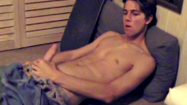 Fabulously tight and lean, Jayden works his cock for a while inside his boxers, and it soon pops out. With the usual noisy straight porn in the background, Jayden gives himself a vigorous hand job.