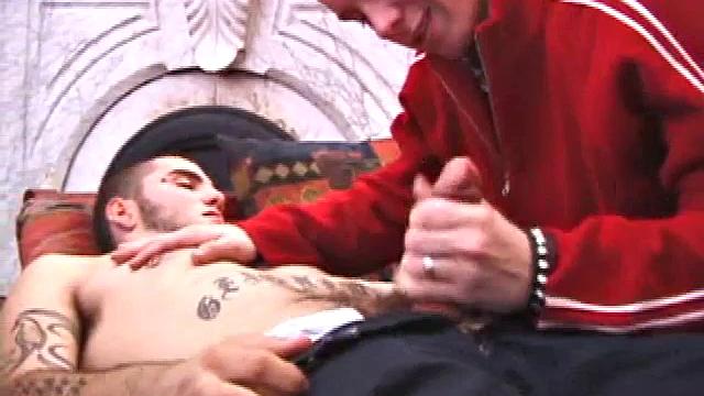 Rock and Roar start off stroking to a porn video and soon they're sucking each other's cock. Roar gets on his back, and Rock fucks the stuff out of him. Roar looks like he might even be in pain.