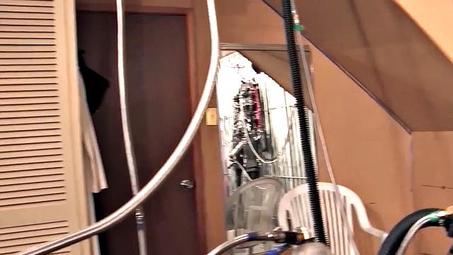 Femdom latex domina torments sub with cock pump