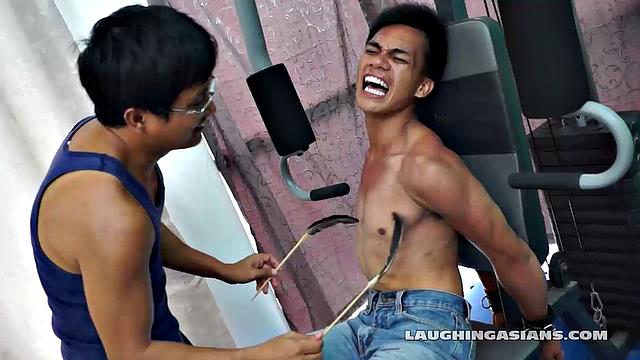 If you love male feet tickling, then this one is sure to excite you beyond your wildest dreams! Cute and sexy Asian boy Argie drops by for his first gym workout with Trainer.