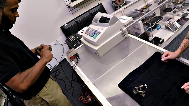 Watch this inked babe get her bald pussy fingered and fucked POV-style in the office