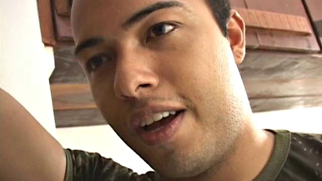Matheus returns to the military dorm after morning run to find dorm mate still snoozing.