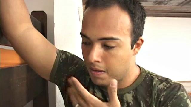 Matheus returns to the military dorm after morning run to find dorm mate still snoozing.