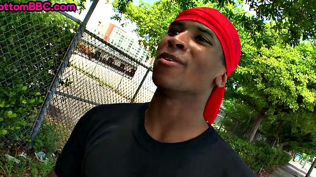 Outdoor black bottom sucks and rides cock for cash