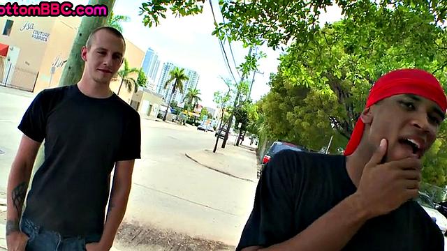 Outdoor black bottom sucks and rides cock for cash