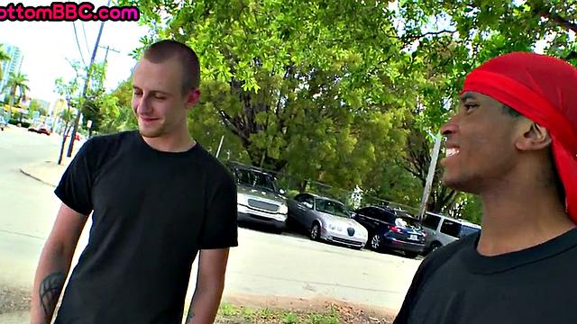 Outdoor black bottom sucks and rides cock for cash